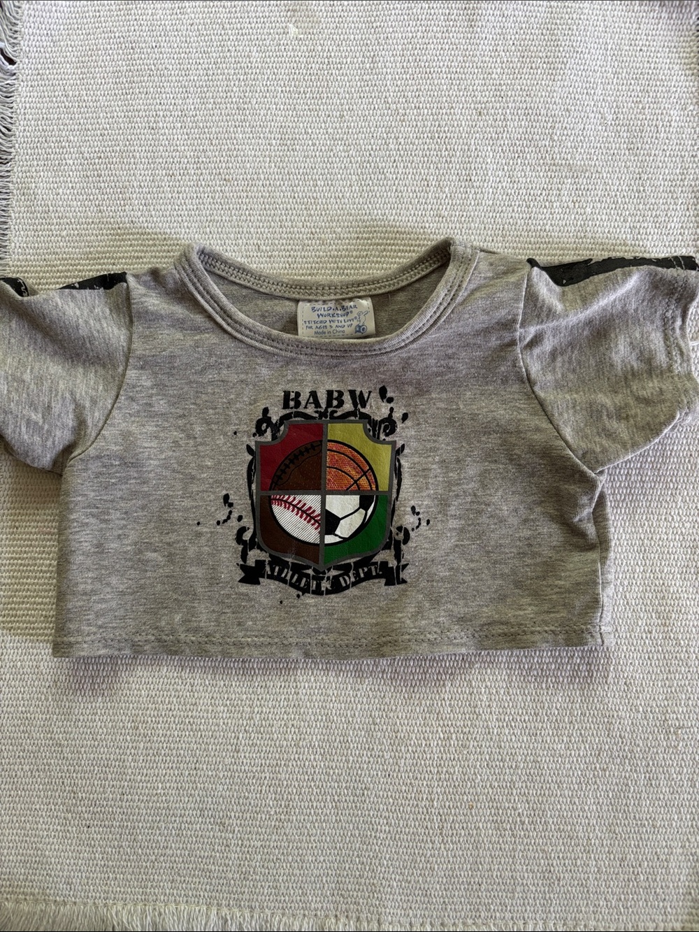 Build-A-Bear T-shirt Gray Short Sleeve Tee with Colorful Sports Crest